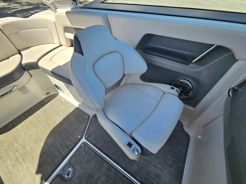 Slide: The Image of 2017 Chaparral 246 SSi boat interior with plush seating and modern design. - 27