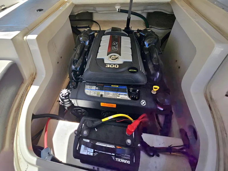 Slide: The Image of Engine compartment of a 2017 Chaparral 246 SSi boat, featuring a 6.2L engine. - 33