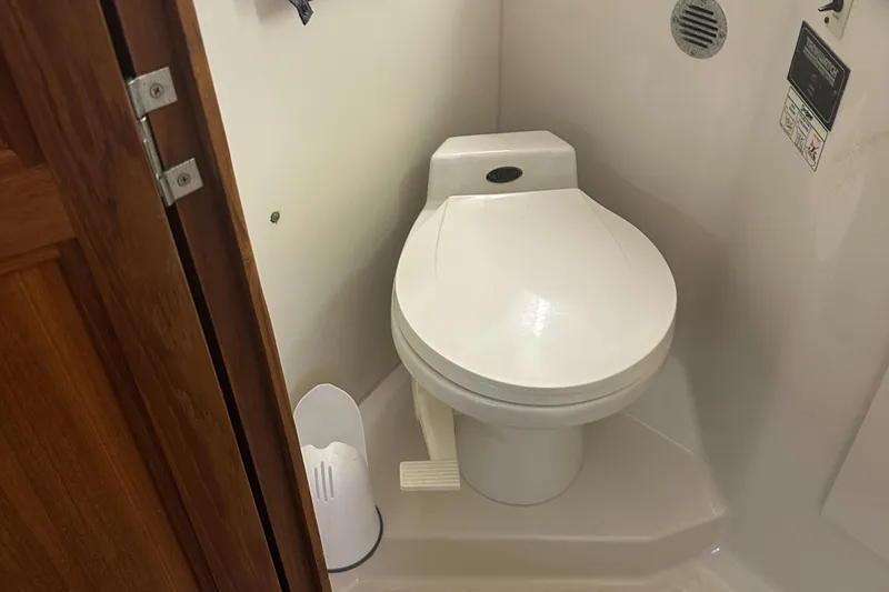 Slide: The Image of Toilet in 1993 Carver 350 Aft Cabin boat bathroom. - 20
