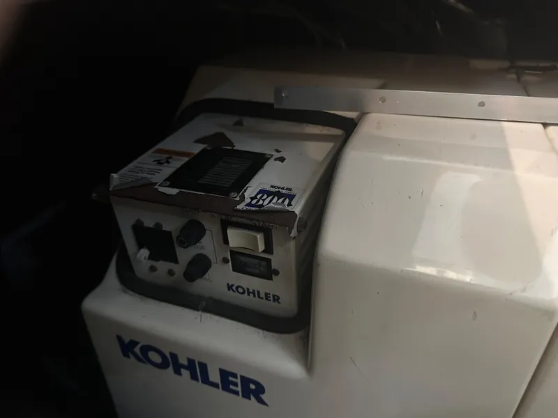 Slide: The Image of Kohler generator in a 1993 Carver 350 Aft Cabin yacht engine room. - 26