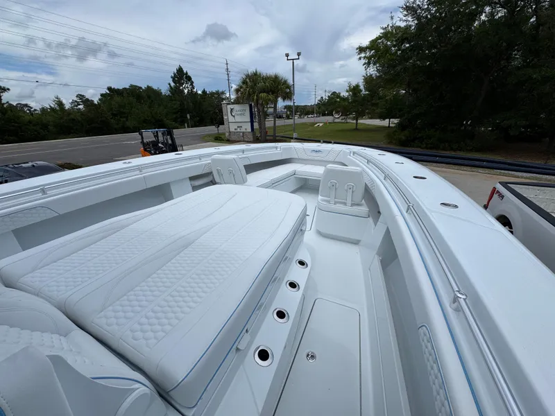 Slide: The Image of 2026 Invincible 43 Open Fisherman boat with spacious deck and seating area. - 14