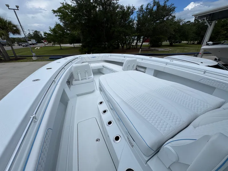 Slide: The Image of 2026 Invincible 43 Open Fisherman boat with spacious seating and sleek design. - 16