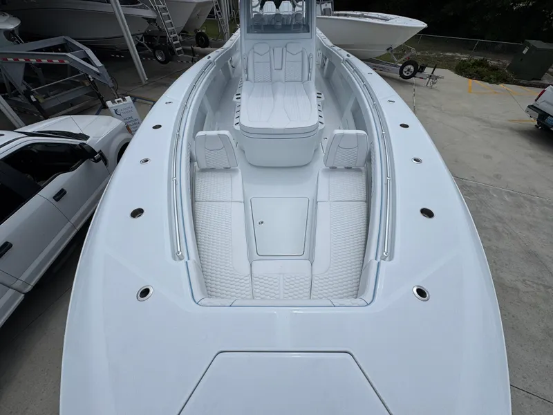 Slide: The Image of 2026 Invincible 43 Open Fisherman boat with spacious deck and seating. - 17