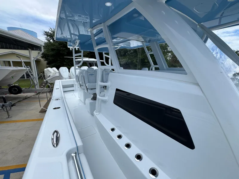 Slide: The Image of 2026 Invincible 43 Open Fisherman boat with sleek white design and spacious deck. - 21