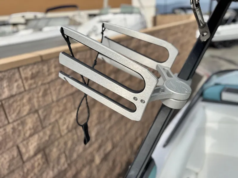 Slide: The Image of Wakeboard rack on 2019 Tigé R21 boat, mounted on a metal frame. - 13