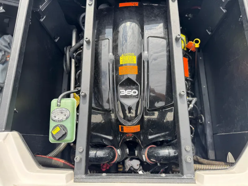Slide: The Image of 2019 Tigé R21 boat engine compartment with 360 engine and ultra-low emissions system. - 24