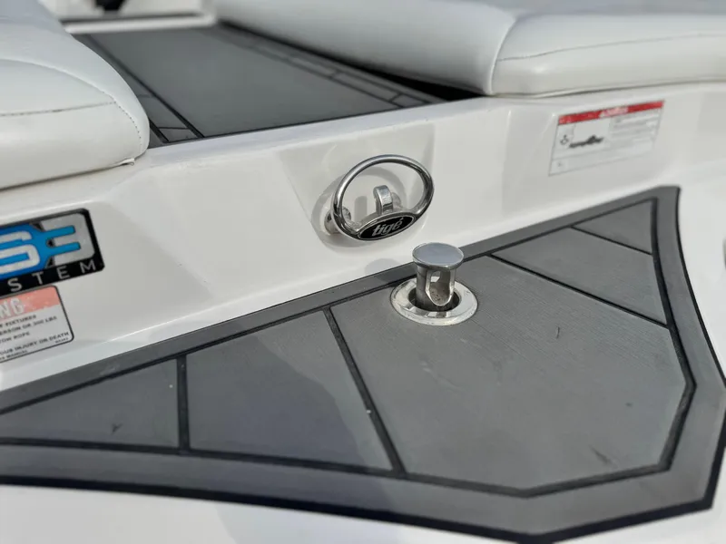 Slide: The Image of 2019 Tigé R21 boat deck with cleat and logo detail. - 7