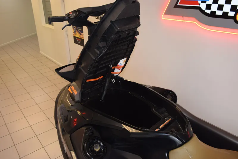 Slide: The Image of 2021 Sea-Doo GTX 170 with open storage compartment in showroom. - 10