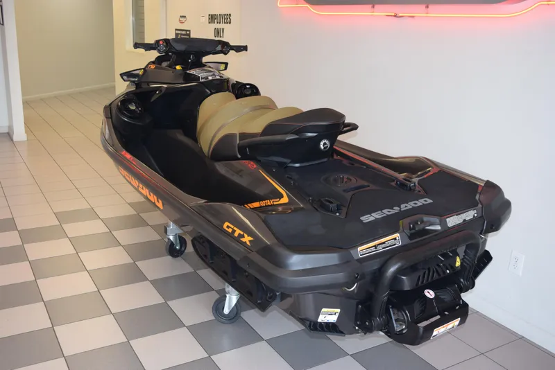 Slide: The Image of 2021 Sea-Doo GTX 170 jet ski displayed indoors on tiled floor. - 4