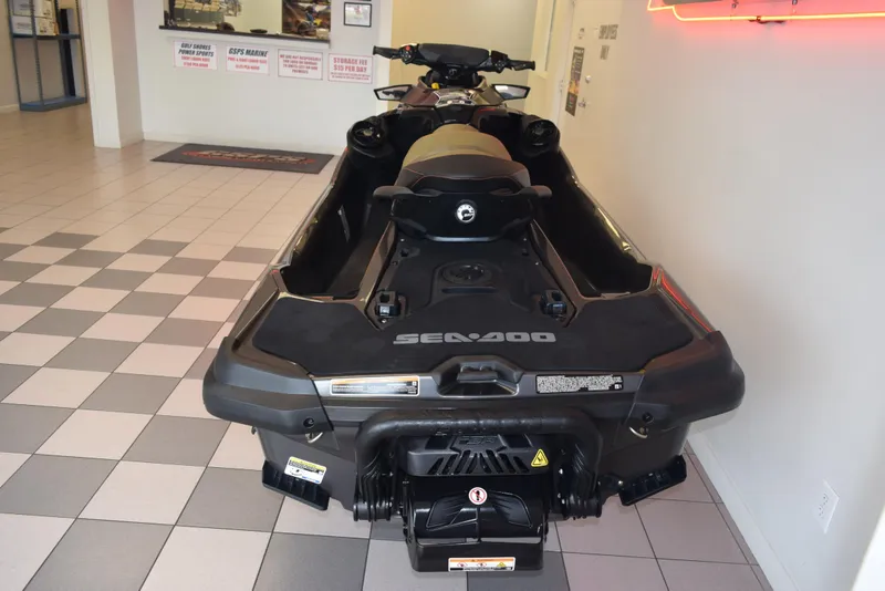 Slide: The Image of 2021 Sea-Doo GTX 170 jet ski displayed indoors on checkered floor. - 5