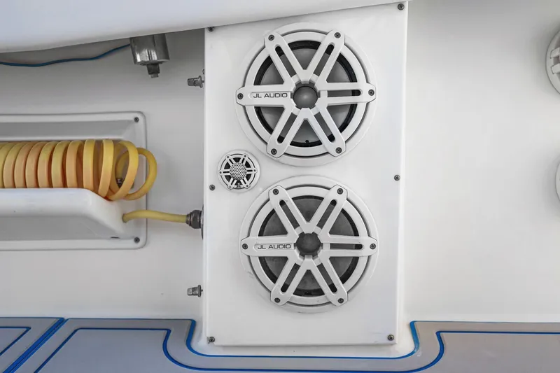 Slide: The Image of Speakers and hose on 2013 Invincible 42 Open Fisherman boat. - 43