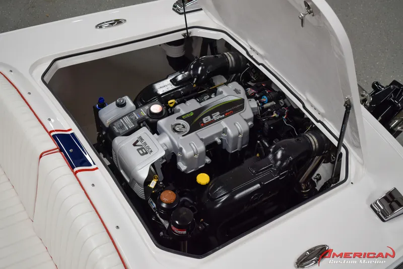 Slide: The Image of 2022 Donzi 22 Classic boat engine compartment with powerful V8 engine. - 10