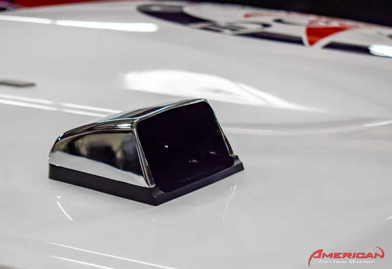 Slide: The Image of Close-up of a 2022 Donzi 22 Classic boat detail with chrome vent. - 13