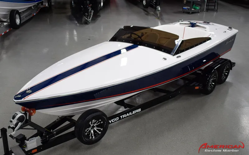 Slide: The Image of 2022 Donzi 22 Classic boat on trailer, sleek design with blue and white color scheme. - 3