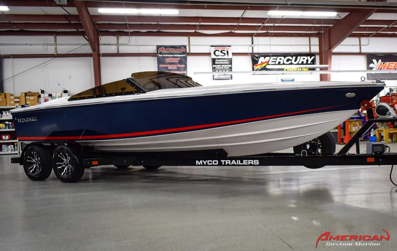 Slide: The Image of 2022 Donzi 22 Classic boat on Myco trailer in showroom. - 4