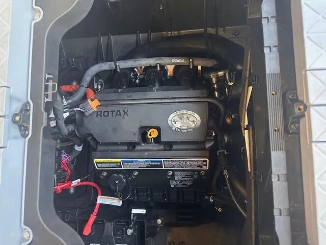 Slide: The Image of 2023 Sea-Doo Sport Boats 18 Switch Sport engine compartment with Rotax engine visible. - 10