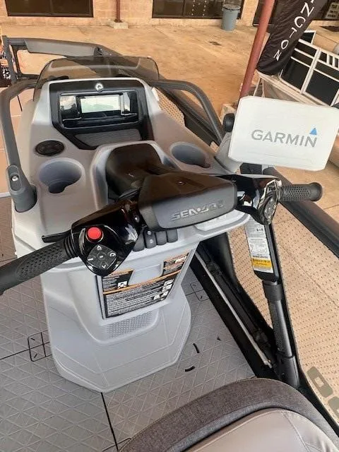Slide: The Image of 2023 Sea-Doo 18 Switch Sport dashboard with Garmin navigation system. - 4