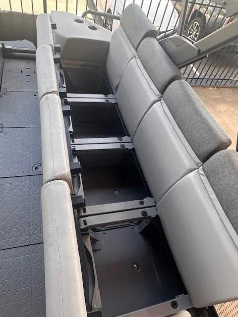 Slide: The Image of 2023 Sea-Doo Sport Boats 18 Switch Sport interior seating with storage compartments. - 5