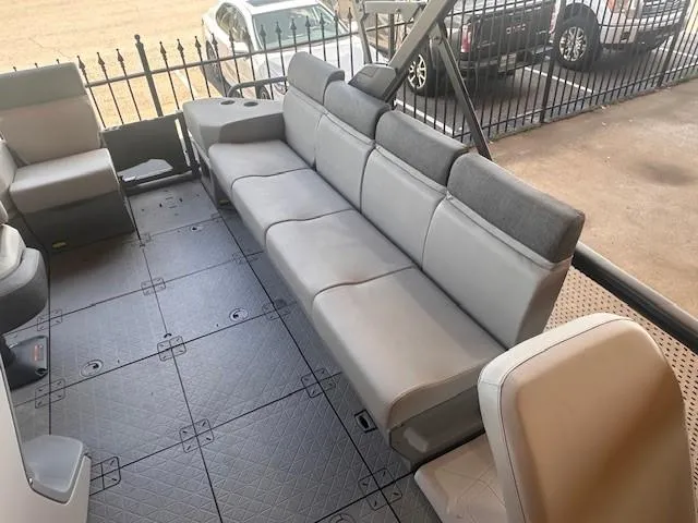 Slide: The Image of 2023 Sea-Doo Sport Boats 18 Switch Sport interior with spacious seating and modern design. - 6