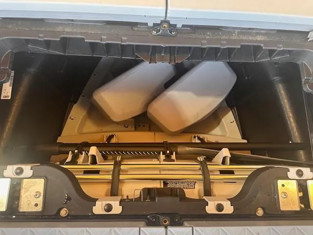 Slide: The Image of 2023 Sea-Doo Sport Boats 18 Switch Sport storage compartment interior view. - 7