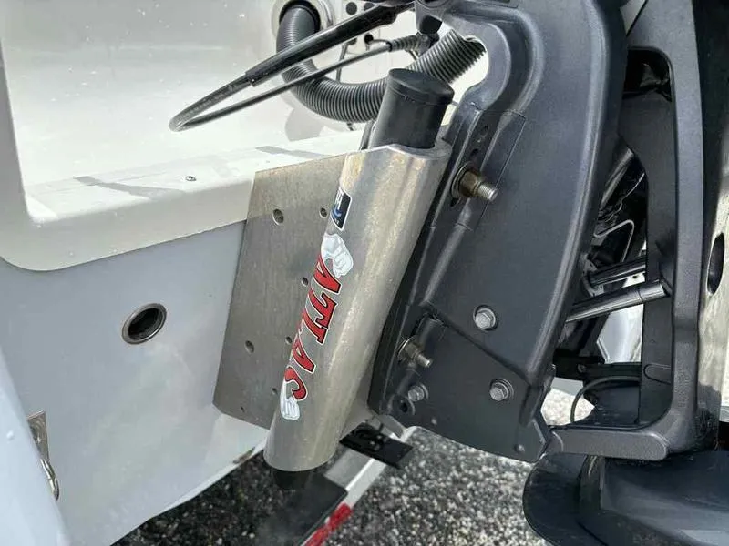 Slide: The Image of 2024 Robalo 246 Cayman boat with Atlas hydraulic jack plate detail. - 16