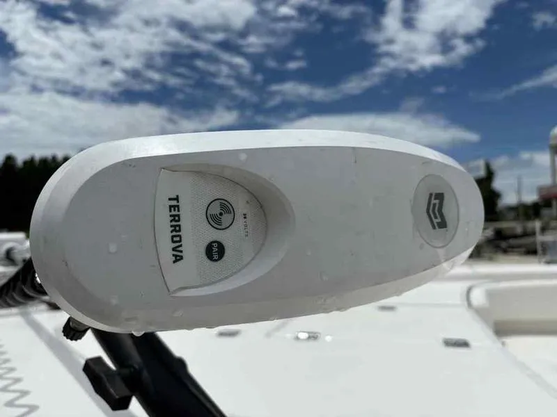 Slide: The Image of Close-up of a Terrova trolling motor on a 2024 Robalo 246 Cayman boat. - 30
