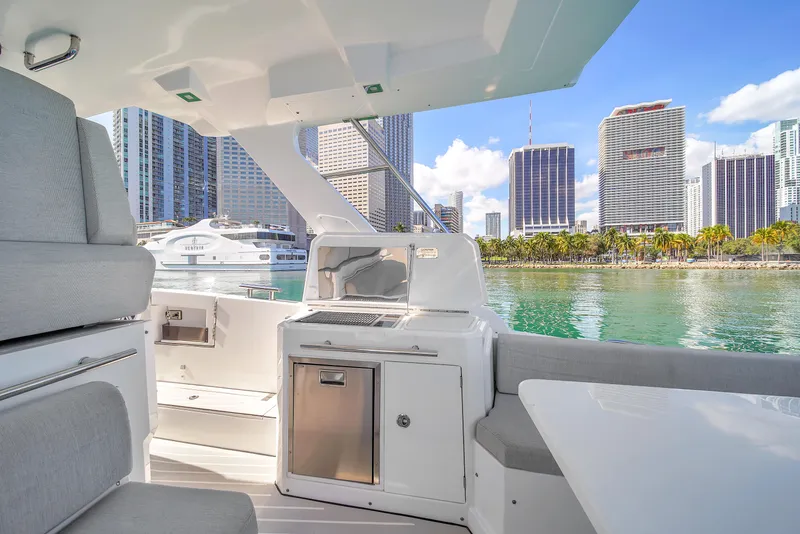 Slide: The Image of Azimut Verve 40 yacht interior with city skyline view, 2020 model. - 14