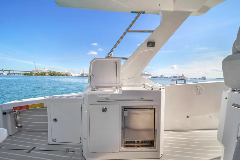 Slide: The Image of 2020 Azimut Verve 40 yacht deck with ocean view and onboard amenities. - 15