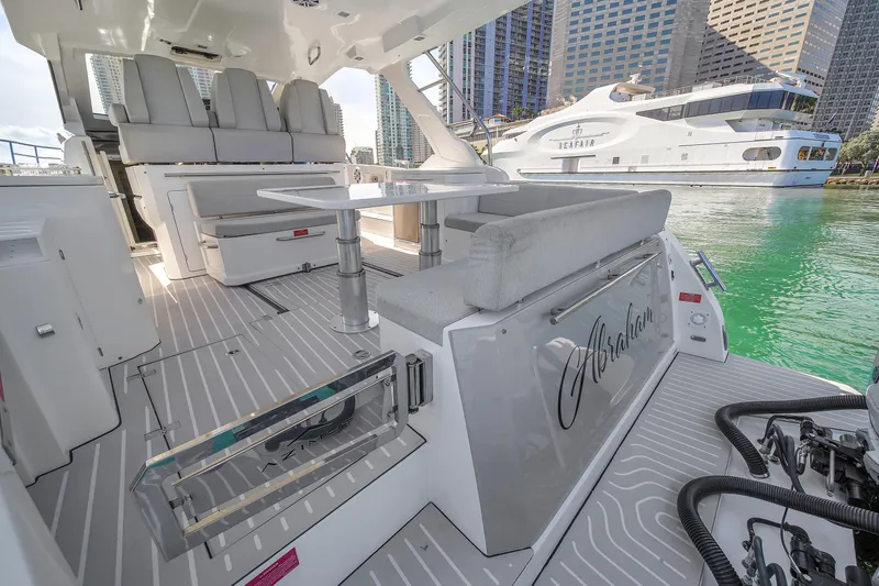 Slide: The Image of Azimut Verve 40 yacht interior, 2020 model, docked in a marina with cityscape background. - 16