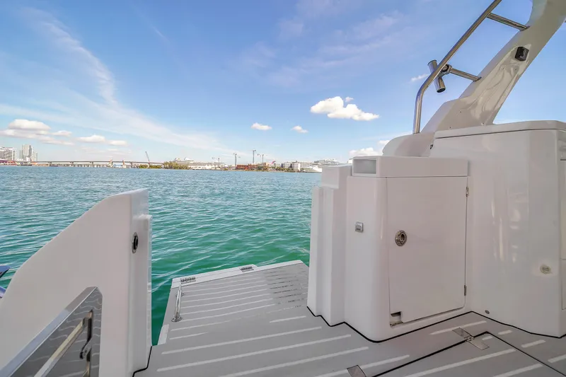Slide: The Image of Azimut Verve 40 yacht deck overlooking serene blue waters, 2020 model. - 17