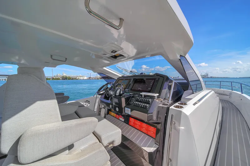 Slide: The Image of Interior view of 2020 Azimut Verve 40 yacht cockpit with modern controls. - 19