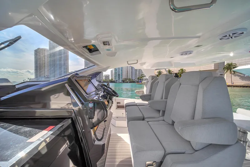 Slide: The Image of Azimut Verve 40 yacht interior, 2020 model, with plush seating and modern controls. - 20