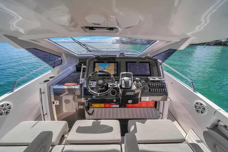Slide: The Image of 2020 Azimut Verve 40 yacht cockpit with modern navigation system and luxurious seating. - 21