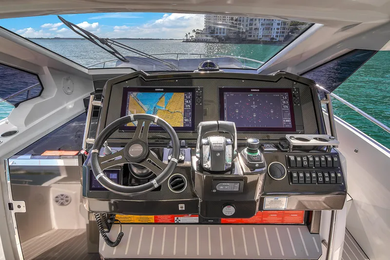Slide: The Image of Cockpit of 2020 Azimut Verve 40 yacht with navigation screens and steering wheel. - 22