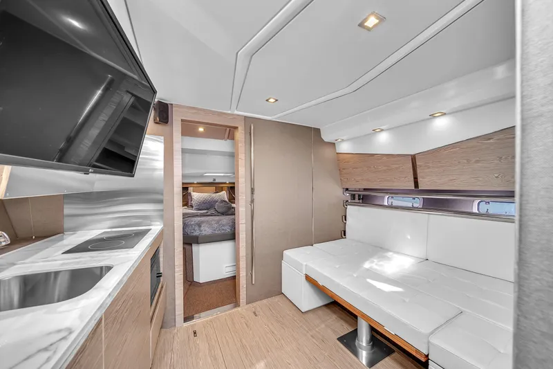 Slide: The Image of Luxurious interior of 2020 Azimut Verve 40 yacht with modern kitchen and seating area. - 24