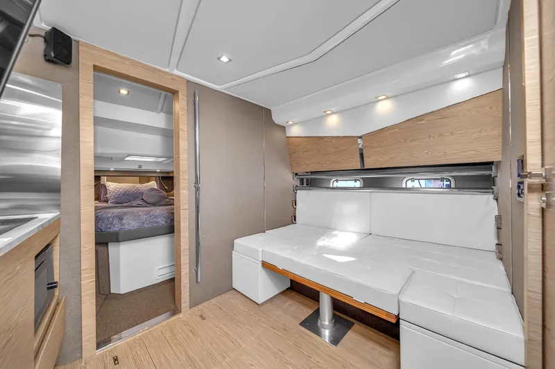 Slide: The Image of Luxurious interior of 2020 Azimut Verve 40 yacht with modern seating and cozy bedroom. - 26