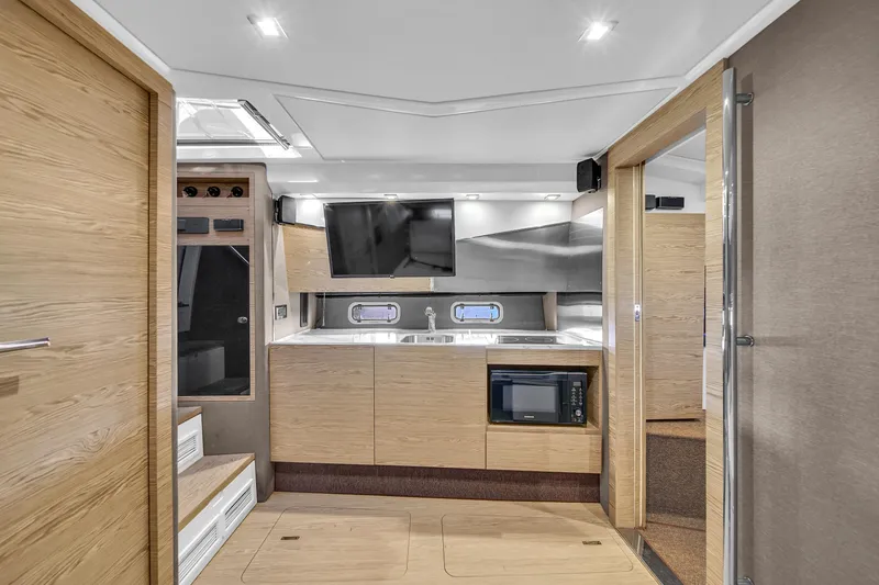 Slide: The Image of Interior of 2020 Azimut Verve 40 yacht with modern kitchen and sleek design. - 28