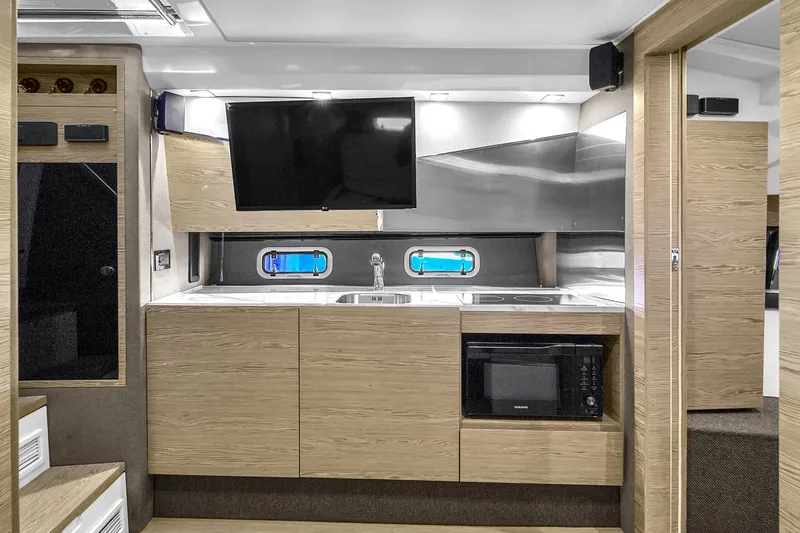 Slide: The Image of Modern kitchen interior of 2020 Azimut Verve 40 yacht with sleek cabinetry and appliances. - 29