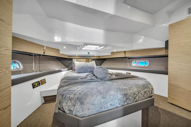 Slide: The Image of Luxurious cabin interior of 2020 Azimut Verve 40 yacht with cozy bedding. - 31