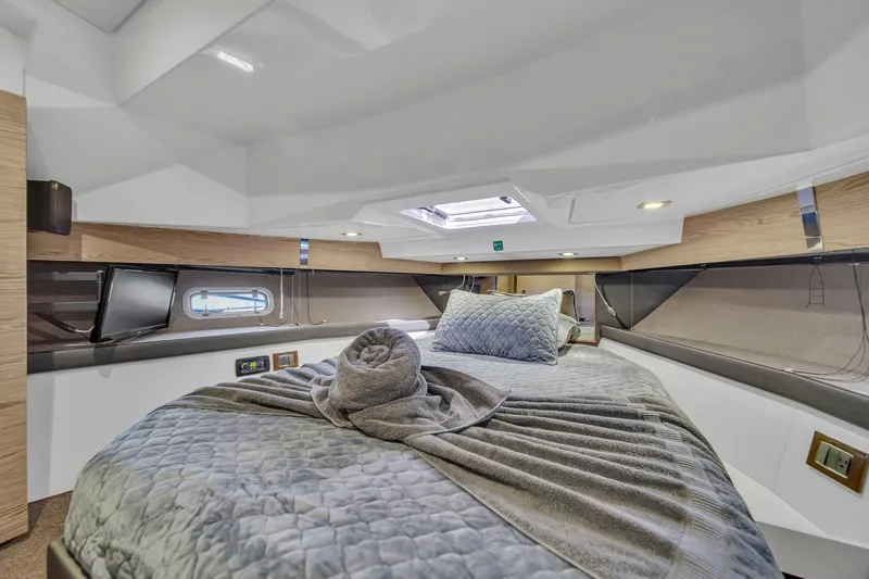 Slide: The Image of Luxurious cabin interior of 2020 Azimut Verve 40 yacht with plush bedding. - 32