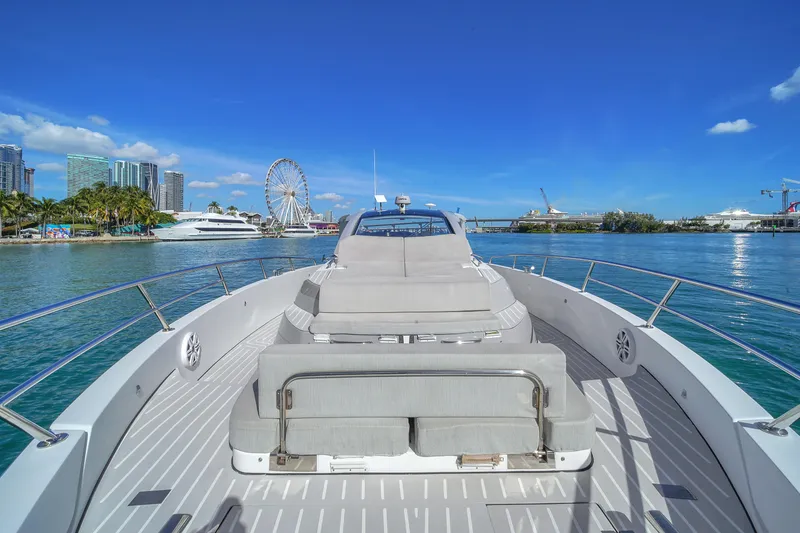 Slide: The Image of 2020 Azimut Verve 40 yacht on scenic waterfront with city skyline and Ferris wheel. - 34
