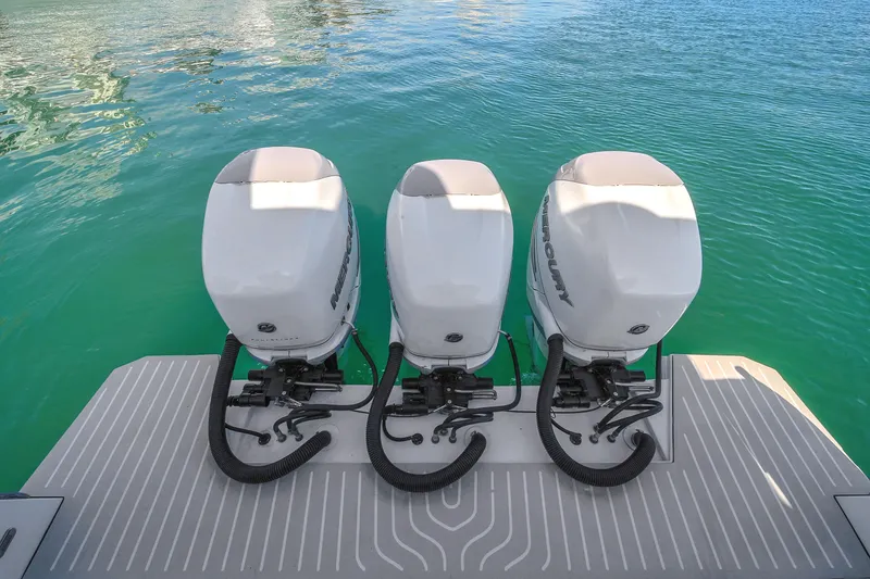 Slide: The Image of Azimut Verve 40 2020 with triple outboard engines on turquoise water. - 39