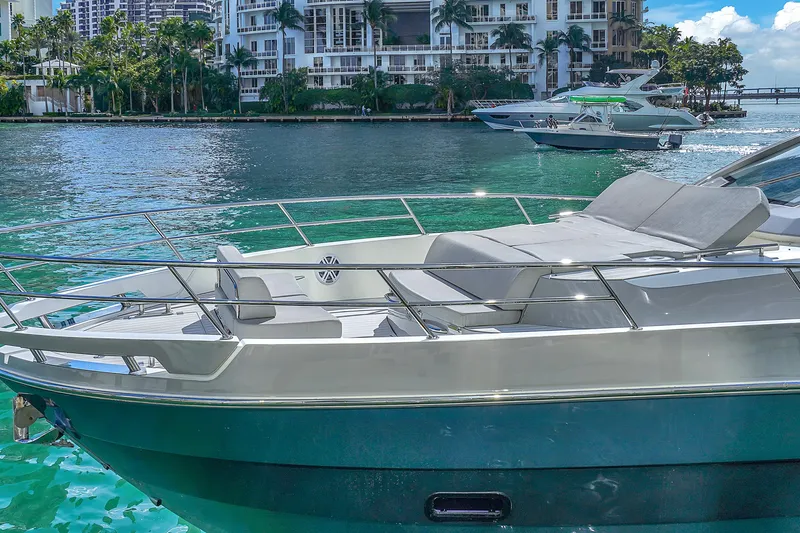 Slide: The Image of Azimut Verve 40 yacht, 2020 model, docked in a scenic waterfront setting. - 4