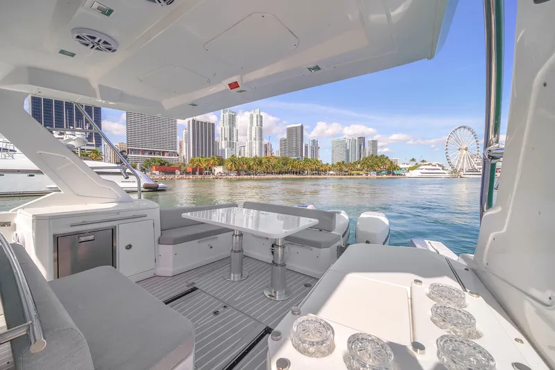 Slide: The Image of Azimut Verve 40 yacht interior with city skyline and waterfront view, 2020 model. - 6