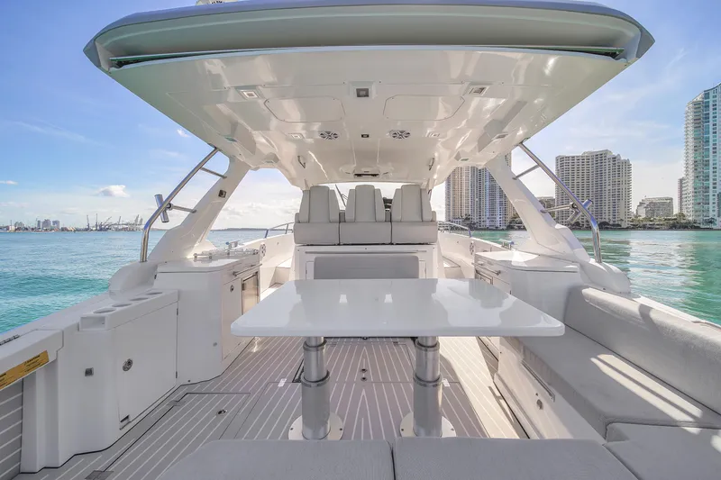 Slide: The Image of Azimut Verve 40 yacht interior, 2020 model, with sleek design and waterfront city view. - 8