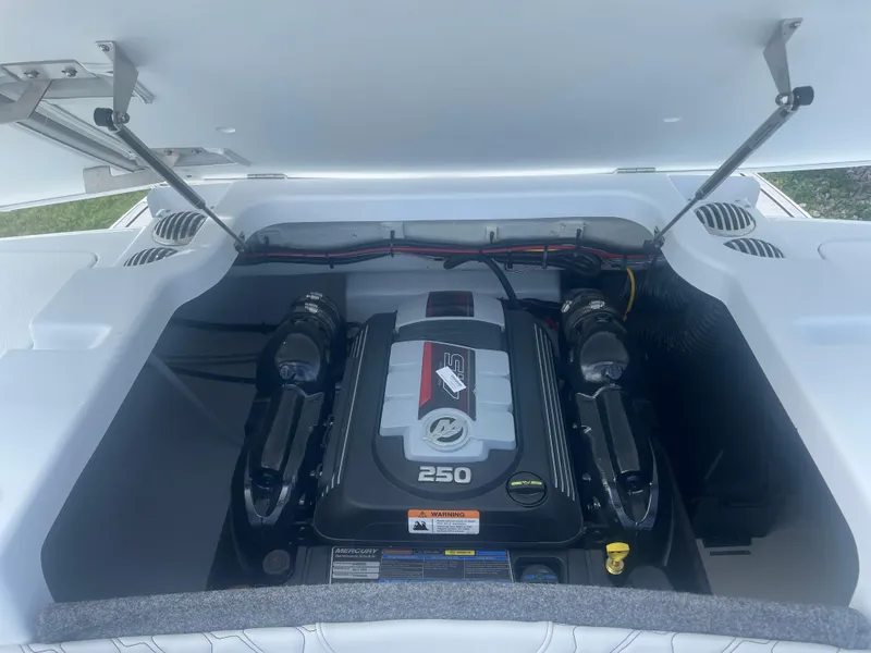Slide: The Image of 2025 Four Winns H4 Freedom boat engine compartment with Mercury 250 engine. - 10