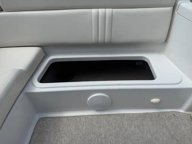 Slide: The Image of 2001 Chris-Craft Launch 25 boat interior storage compartment with speaker. - 26