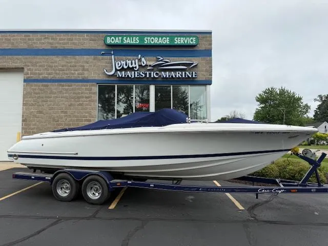 Slide: The Image of 2001 Chris-Craft Launch 25 boat on trailer at Jerry's Majestic Marine dealership. - 32