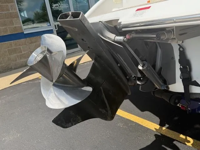 Slide: The Image of Propeller and stern of 2001 Chris-Craft Launch 25 boat in parking lot. - 36
