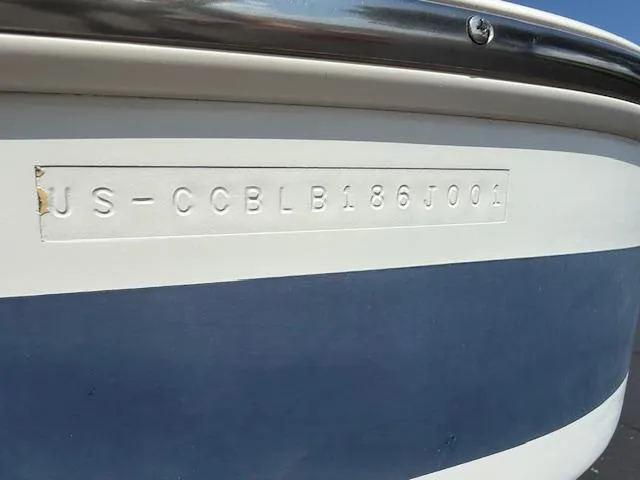 Slide: The Image of 2001 Chris-Craft Launch 25 boat hull with visible identification number. - 38